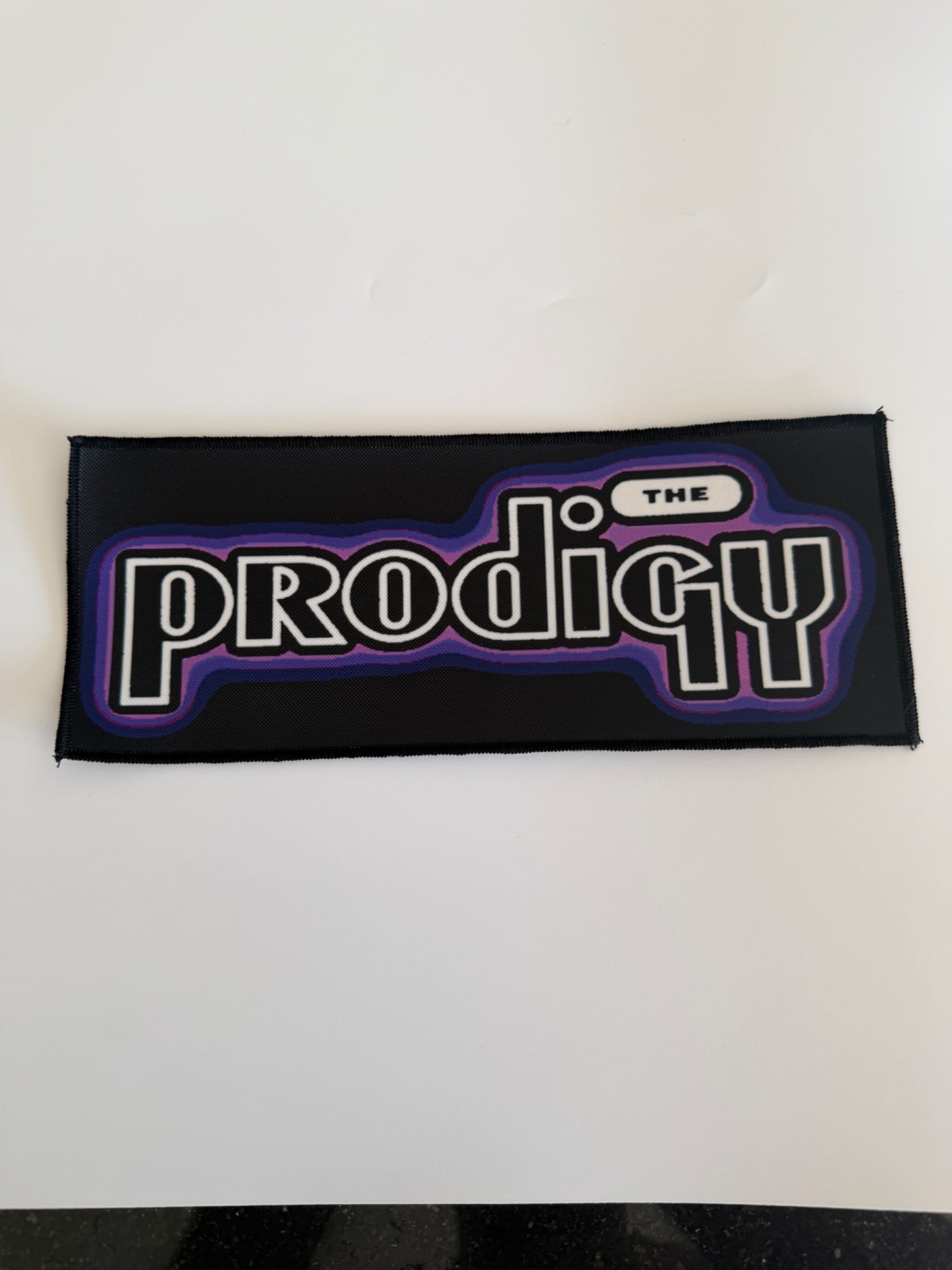 Merchandise - The Prodigy - Logo Woven Patch (Black, Purple)
