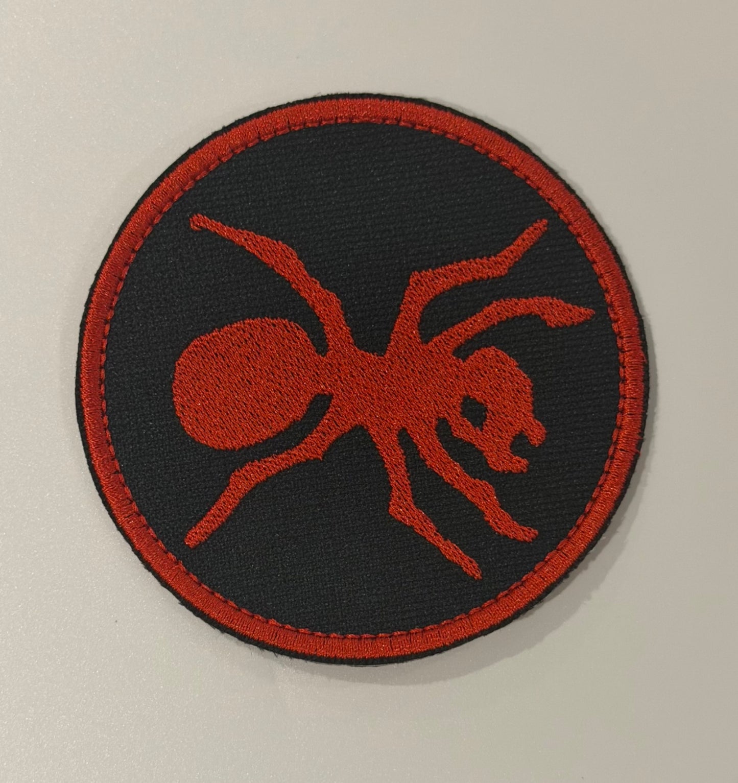 The Prodigy Ant Logo Embroidered Patch - Black & Red Round Sew-On Badge